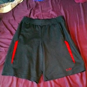 Black shorts with red stripes. C9 by Champion. Boys small